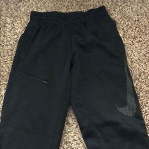 Nike dri-fit sweatpants with zipper pocket